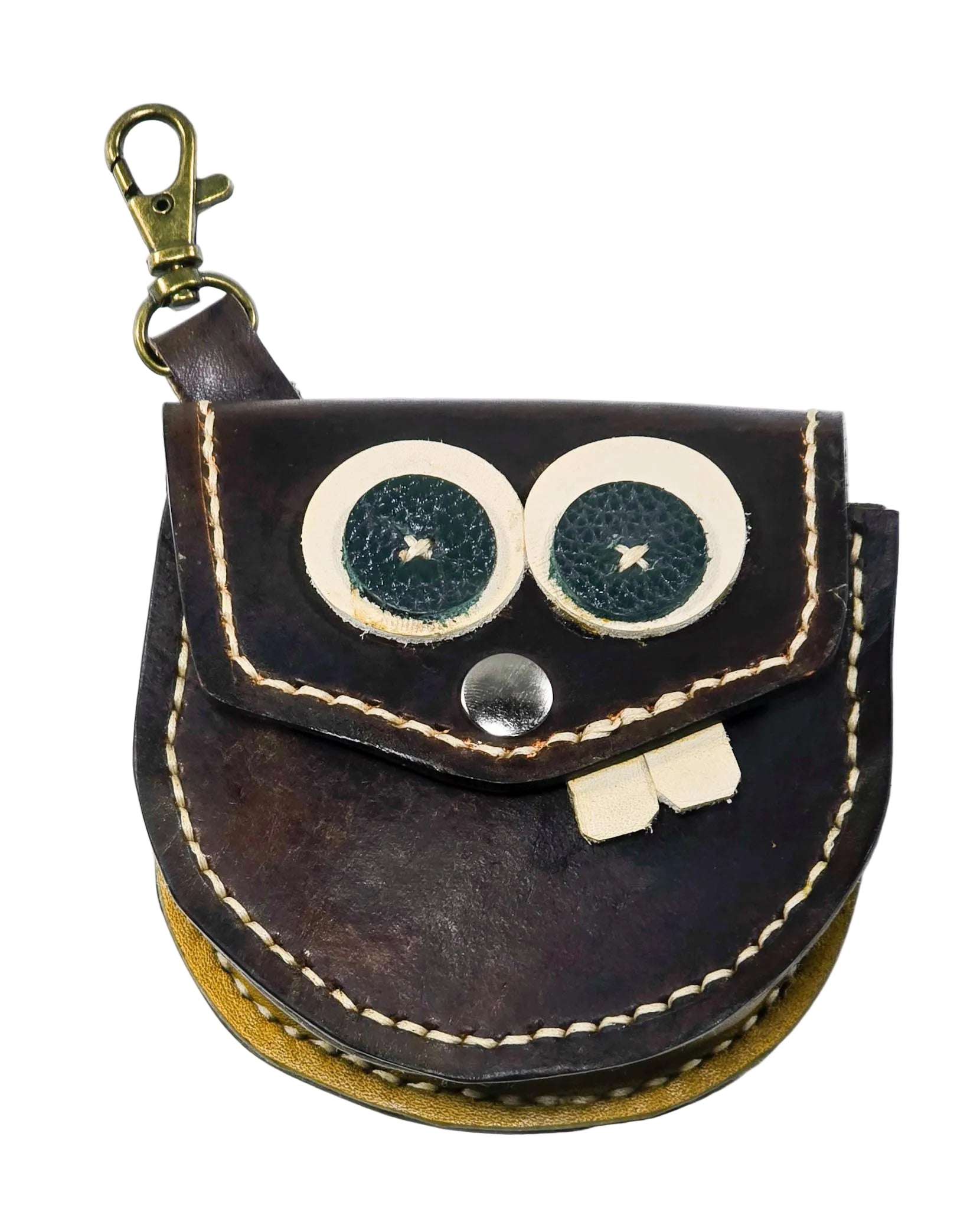 Handmade Tiny Critter leather coin purse with a two-tone dyed finish, featuring attached eyes and teeth details for a fun monster-inspired look.