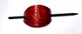 Oxblood leather hair barrette, with laser engraved celtic knot, hand dyed oxblood. Smooth black stick in the back on a white background
