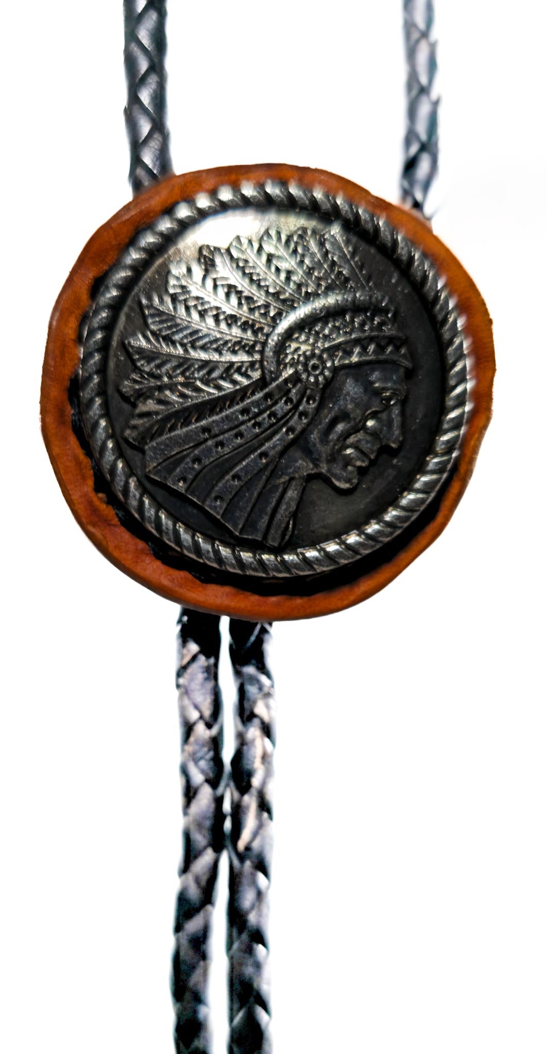 Bolo tie with Native American chief design on a white background