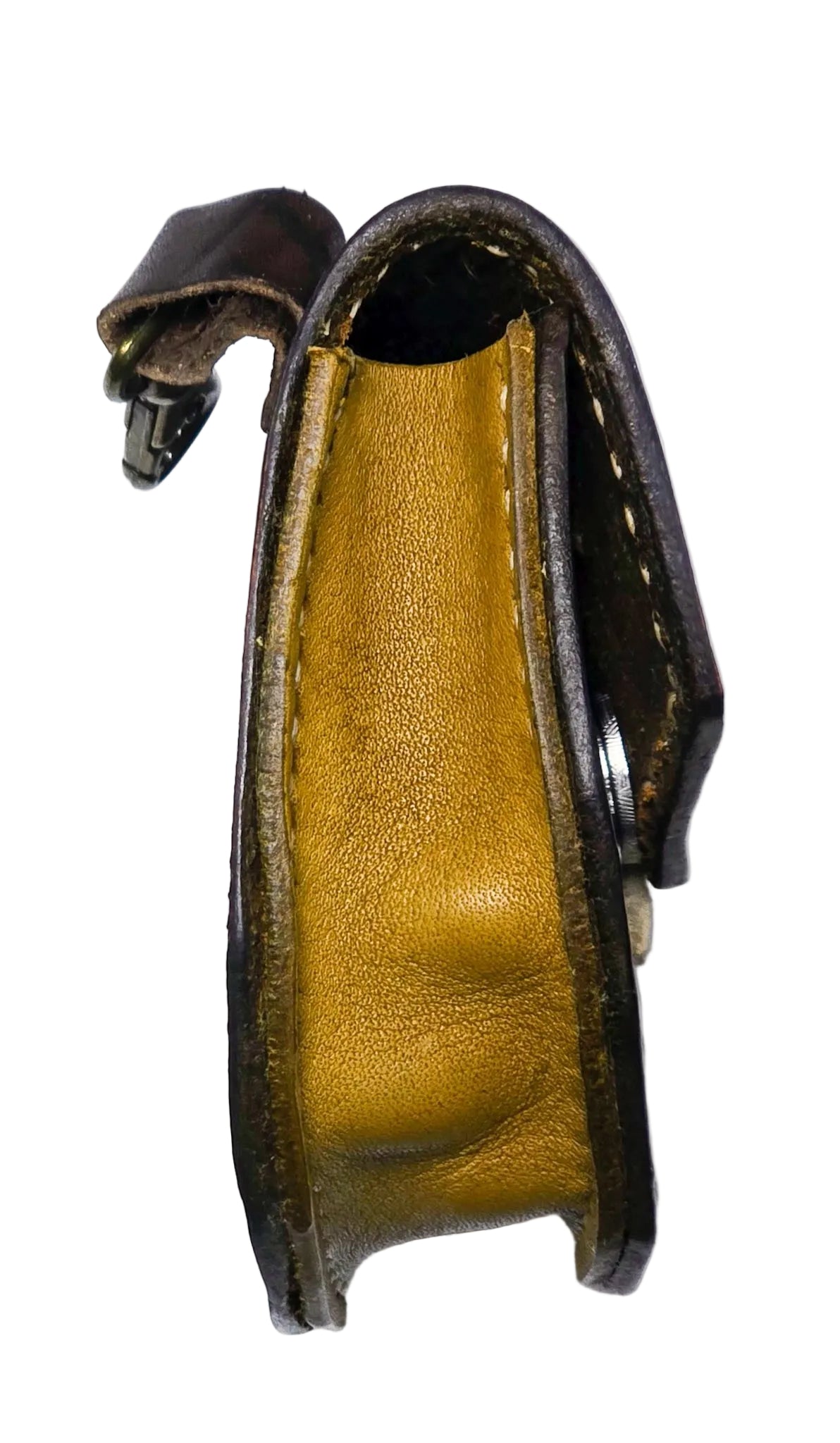 He doesn't bite, but he *will* hold onto your spare change. 🦷👀 Hand-dyed and built from tough veg-tan leather, our Tiny Critter Purse clips onto your backpack or belt loop to keep the small stuff safe (and adorable)