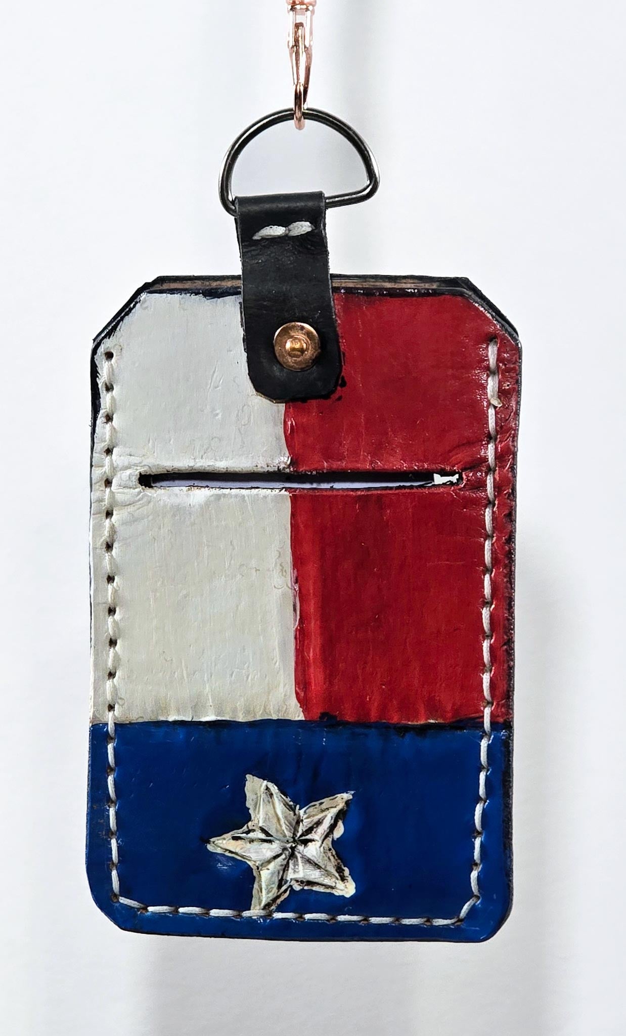 ID badge holder with hand painted Texas flag design on a white background.