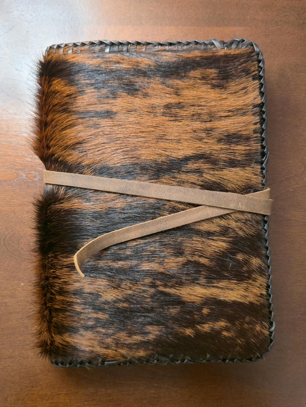Hair on leather journal cover - Luxury handmade leather notebook protector on a wood surface