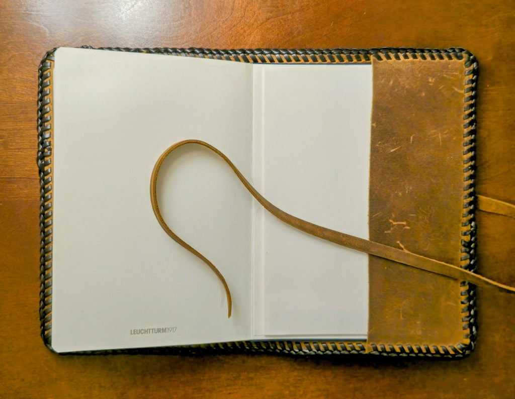 Inside view Hair on leather journal cover - Luxury handmade leather notebook protector on a wood surface
